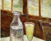 A Table in front of a Window with a Glass of Absinthe and a Carafe